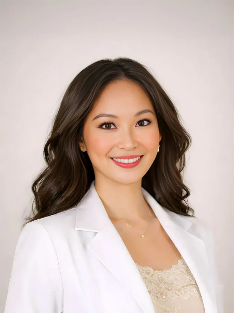 Portrait of Nurse Anj from Luxe Lips Cosmetic Clinic Melbourne smiling in a professional clinic portrait