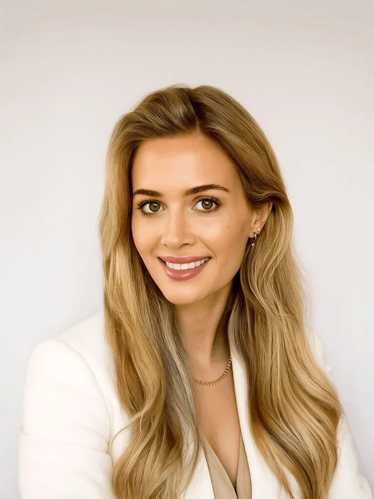 Portrait of Nurse Chloe from Luxe Lips Cosmetic Clinic Melbourne smiling in a professional clinic setting