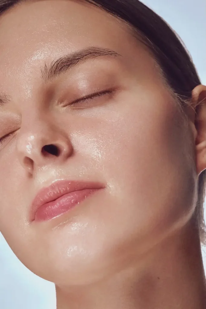 Close up of smooth glowing skin on the cheek and jawline after bioremodelling treatment aftercare
