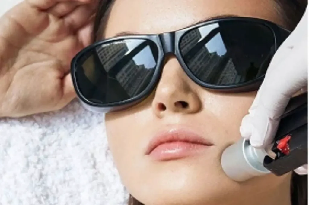 Close-up of a patient wearing protective eyewear during a PicoSure laser skin revitalisation session.