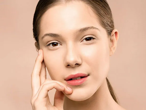 A Luxe Lips patient showing firm, youthful skin after a skin tightening treatment.