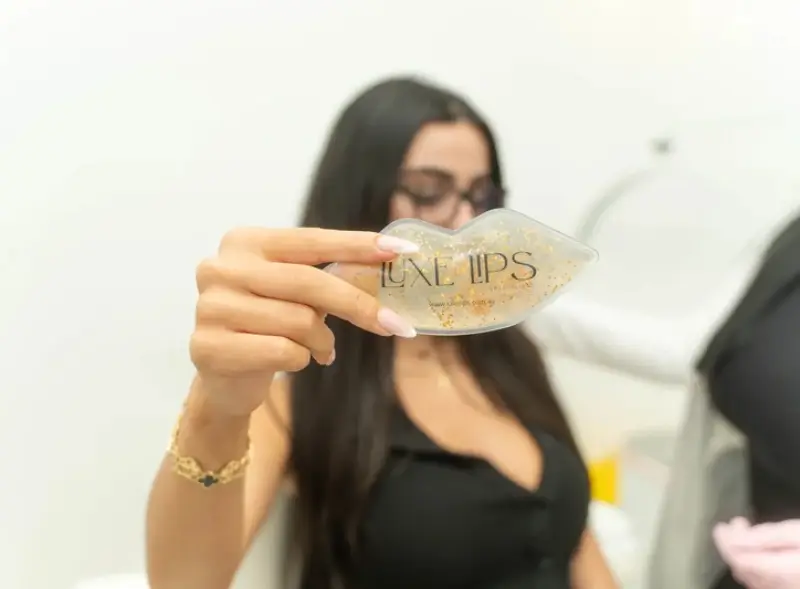 Luxe Lips branded lip-shaped cold compress for lip filler aftercare
