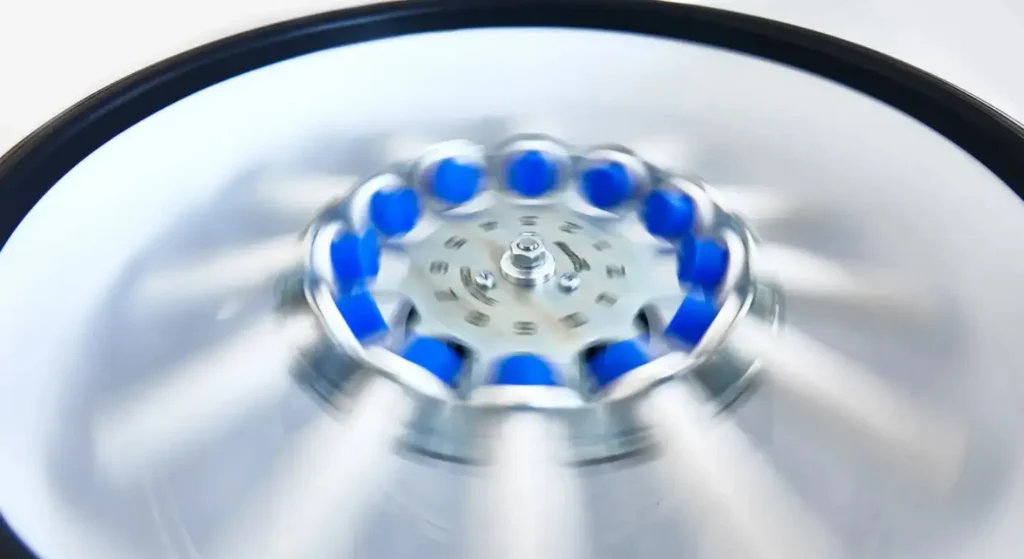 A medical centrifuge in motion, used to process Platelet-Rich Fibrin (PRF) for skin applications in Melbourne.