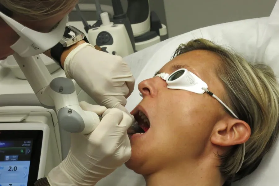 Client recieiving the SmoothLiftin™ intraaloral mode of the Fotona 5D protocol
