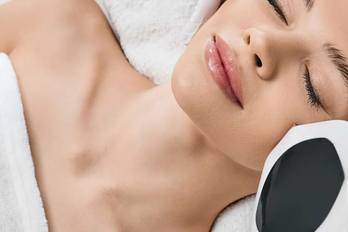 Woman receving laser treatments representing a combined apporach using Morheus8 and Lumecca IPL